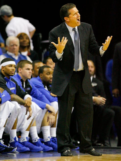 Memphis head coach John Calipari coaches his team to victory against Fairfield in an NCAA college basketball game Saturday, Nov. 15, 2008, in Memphis, Tenn. With the win, Calipari tied his former Tiger mentor Larry Finch as the coach with the most wins in Memphis basketball history with 220.