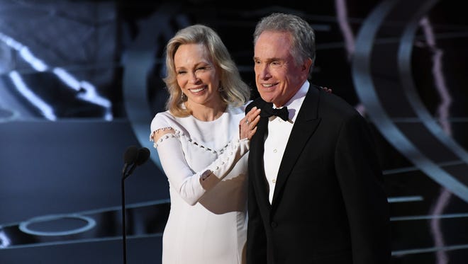 Faye Dunaway and Warren Beatty present the award for Best Motion Picture of the Year during the 89th Academy Awards.