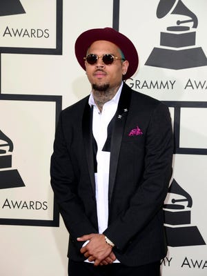 Chris Brown arrives at the Grammy Awards in February.