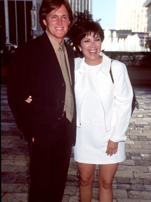 Jenner and wife at the 14th annual Sports Spectacular honoring Wayne Gretzky, Tommy Hearns, Jackie Joyner Kersee, and Randall Cunningham in 1999.