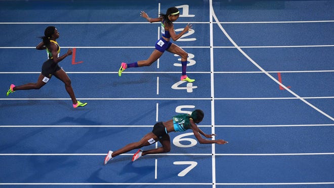 Aug. 15: Shaunae Miller of the Bahamas created quite the memorable moment when she dove across the finish line to win the gold medal in the women's 400 meters. Miller's dive helped her edge American Allyson Felix by 0.07 seconds.