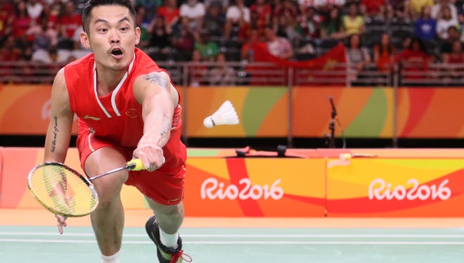 Dan Lin of China competes against Chong Wei Lee of Malaysia in a men's singles semifinals badminton match at Riocentro - Pavilion 4 during the Rio 2016 Summer Olympic Games.