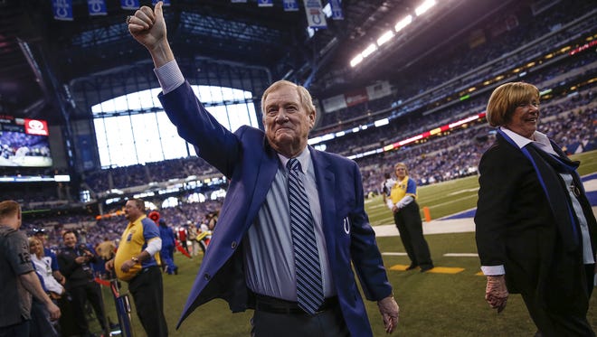 FILE -- Bill Polian, who spent 14 years as general manager of the Indianapolis Colts, makes his way off the field after being inducted into the Colts Ring of Honor on Sunday, Jan. 1, 2017. Polian becomes the 13th member added to the Colts Ring of Honor.