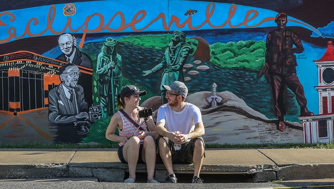 Melissa Moore, left, and Shawn McCaughan, right, and New Brunswick, Canada, take a photo in front of a mural in Hopkinsville on Sunday morning.
August 20, 2017