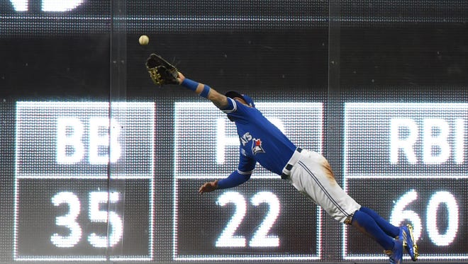 ALDS, Game 3: Blue Jays center fielder Kevin Pillar dives but can't make the catch on a two-run double by Rangers' Mitch Moreland in the 6th inning.