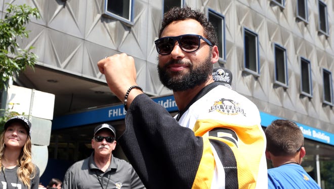 Defenseman Trevor Daley. Signed a three-year, $9.5 million deal with the Red Wings.
