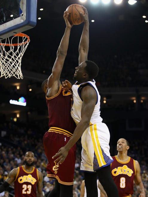Draymond Green's shot is blocked by Tristan Thompson.