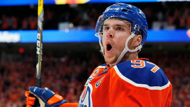 Forward Connor McDavid. Signed eight-year, $100 million extension with the Oilers.