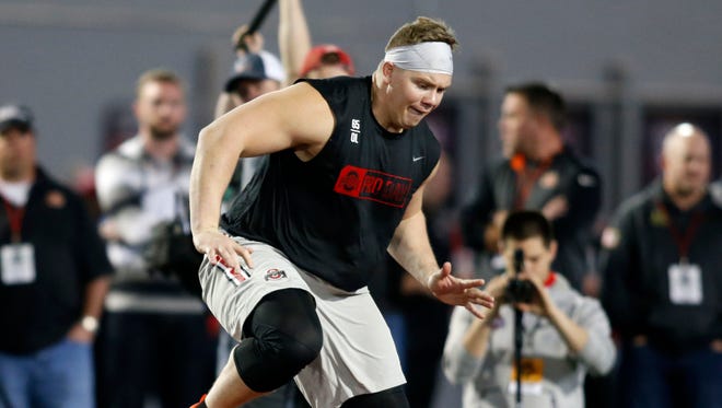 Lineman Pat Elflein runs a drill dash during football  pro day at Ohio State University in Columbus, Ohio, Thursday, March 23, 2017.