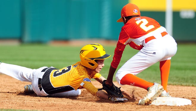 Texas infielder Malcolm Deason (2) tags out North Carolina runner Will Casey (3) at second base during the second inning.