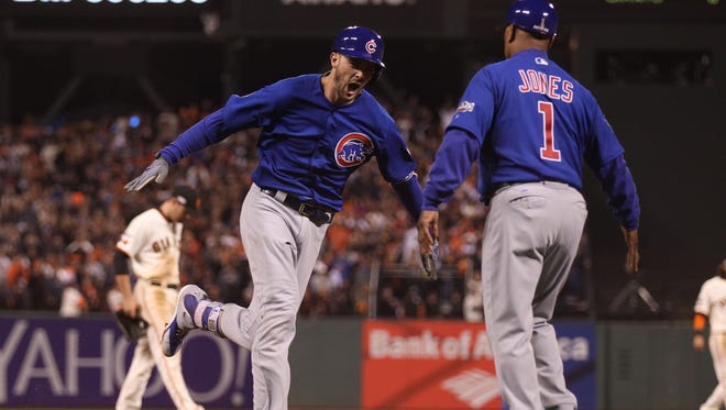 NLDS, Game 3: Cubs' Kris Bryant hits a two-run homer in the ninth to tie the game against the Giants 5-5.