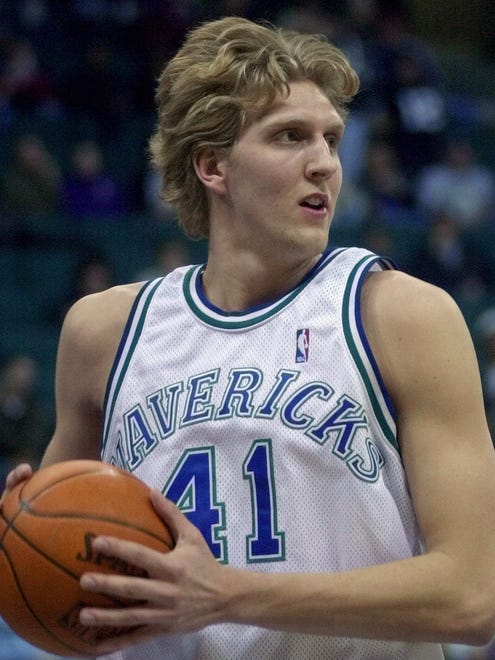 2000: Dirk Nowitzki looks across the court during the first quarter of a game against the Portland Trail Blazers/