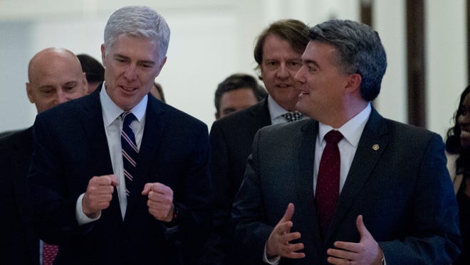 Gorsuch walks with Sen. Cory Gardner, R-Colo., on Capitol Hill on Feb. 1, 2017.