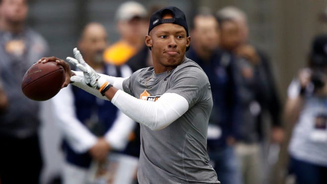 Quarterback Josh Dobbs throws to a receiver during Tennessee NFL Pro Day on Friday, March 31, 2017, in Knoxville, Tenn.