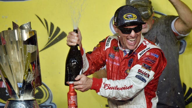 Kevin Harvick celebrating his victory in the season finale at Homestead-Miami Speedway, won the 2014 championship. Harvick is from Bakersfield, Calif.