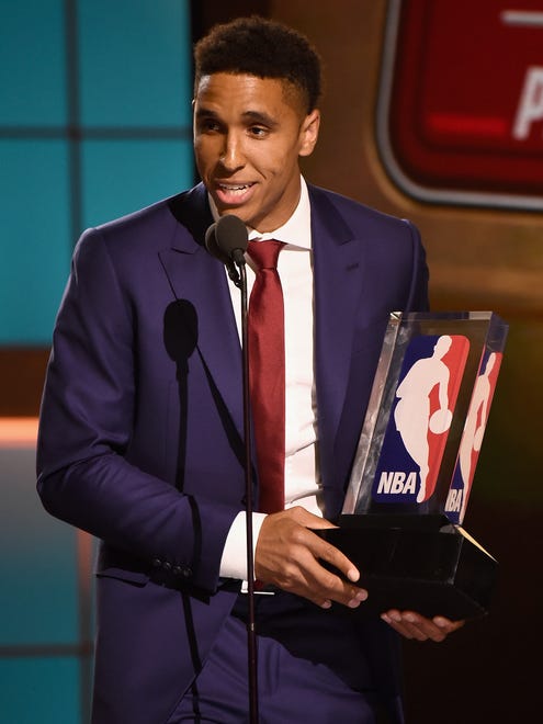 NBA Rookie of The Year Winner, Malcolm Brogdon, speaks on stage during the 2017 NBA Awards.