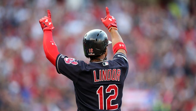 Game 2, ALCS: Francisco Lindor drives in the go-ahead run in the third inning off Blue Jays' J.A. Happ.