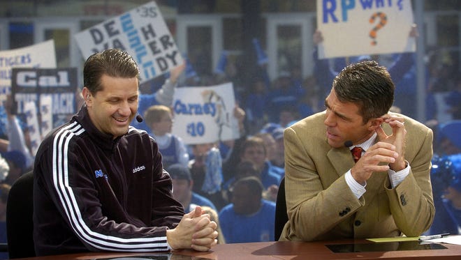 February 26, 2005 - Tiger basketball fans create a rowdy backdrop as Coach John Calipari and Chris Fowler prepare for an interview during the filming of ESPN's College GameDay outside the FedExForum Saturday morning.