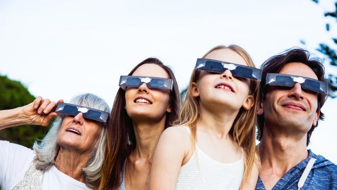 Solar glasses help people view the eclipse safely.