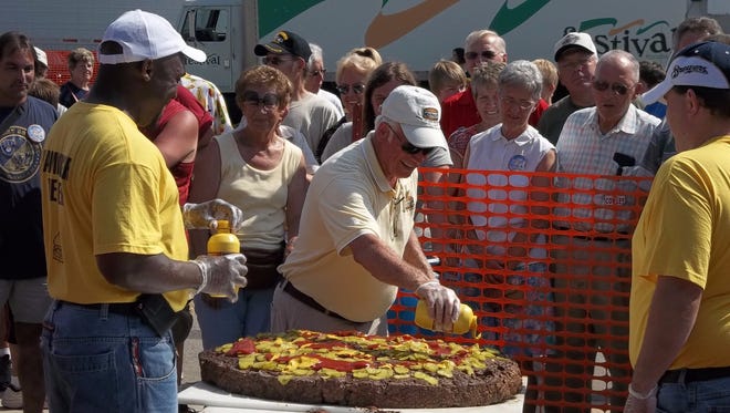 In Wisconsin, Seymour hosts Burger Fest, August 11-12. The city is where Hamburger Charlie invented the hamburger in 1885 and celebrates its claim to fame with an eating contest, a giant hamburger (pictured), a ketchup slide and more activities.