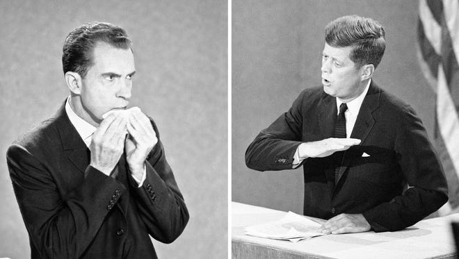 Nixon dabs at his chin and lip during his debate with Kennedy on Oct. 13, 1960. Nixon was in a studio in Los Angeles, while Kennedy was in a studio in New York.