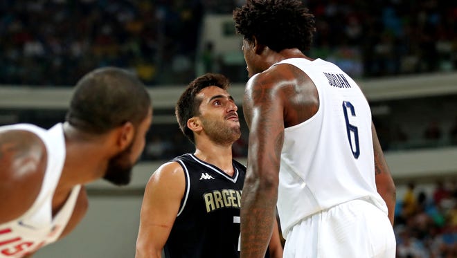 Aug 17: Argentina guard Facundo Campazzo, left, wasn't backing down from USA center DeAndre Jordan during the men's basketball quarterfinals, but his tenacity was ultimately unrewarded. Jordan and the USA rolled to a 105-78 victory on their way to the gold medal.