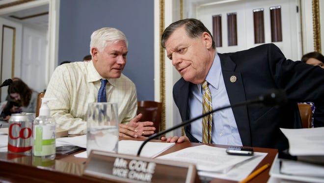 House Rules Chairman Pete Sessions, R-Texas, left, and Vice Chairman Tom Cole, R-Okla., confer on March 22, 2017, as the panel meets to shape the final version of the Republican health care bill before it goes to the floor for debate and a vote.