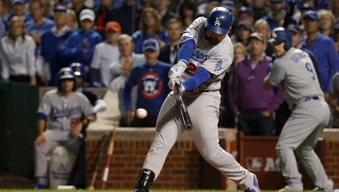 NLCS, Game 1: Dodgers' Adrian Gonzalez ties the game against the Cubs 3-3 with a two-RBI single in the eighth inning.
