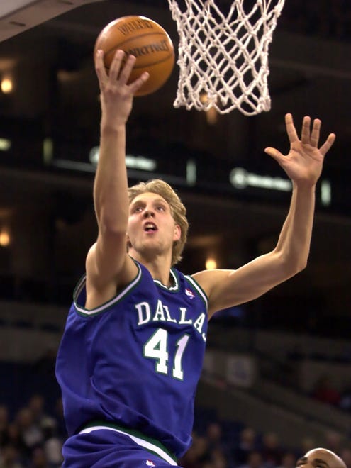 2000: Dirk Nowitzki goes up for a shot during the first half against the Golden State Warriors.