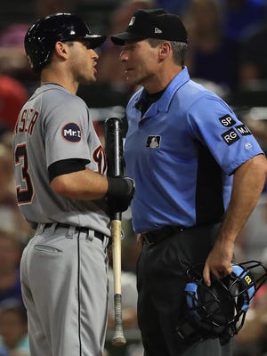 Ian Kinsler of the Tigers is ejected by home plate umpire Angel Hernandez.