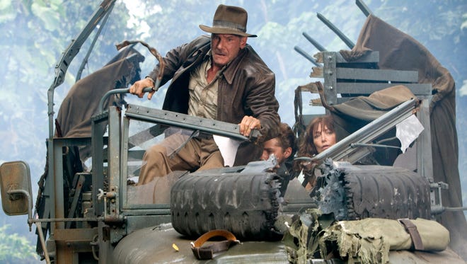 Harrison Ford, left, Shia LaBeouf, and Karen Allen appear in a scene from the motion picture "Indiana Jones and the Kingdom of the Crystal Skull."