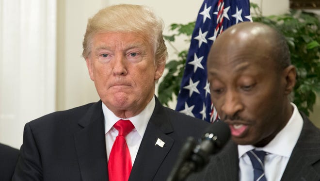 President Trump, left, with Merck CEO Kenneth Frazier on July 20, 2017, at the White House.