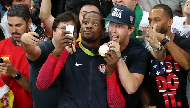 Aug. 21: Olympic selfies were all the rage in Rio, and USA star Kevin Durant was happy to oblige fans after defeating Serbia to capture the gold medal. Durant and the USA went undefeated in the tournament to capture their third consecutive Olympic gold.