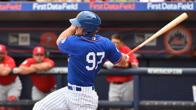 March 8: Tim Tebow wore the No. 97 at Mets camp .