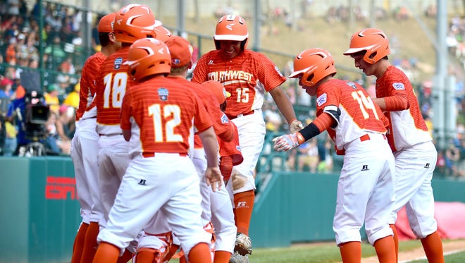 Texas hitter Mark Requena (15) celebrates his go-ahead home run in sixth inning against North Carolina.