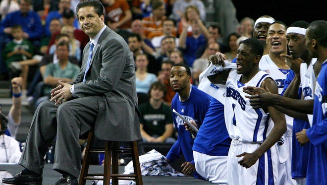 March 28, 2008 - Memphis head coach John Calipari and the Tiger bench have a strikingly different reaction to a made Tiger basket during first half action of the Sweet 16 game against Michigan State.