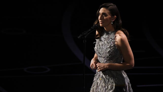 Sara Bareilles sings the Joni Mitchell song 'Clouds' during the In Memorium segment of  the 89th Academy Awards.
