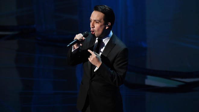 Lin Manuel Miranda performs 'How Far I'll Go' from 'Moana' with  and Auli'i Cravalho during the 89th Academy Awards.
