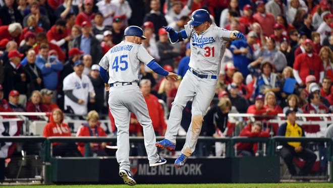 NLDS, Game 5: Dodgers' Joc Pederson leads off the seventh inning with a solo home run off Max Scherzer to tie the game 1-1.