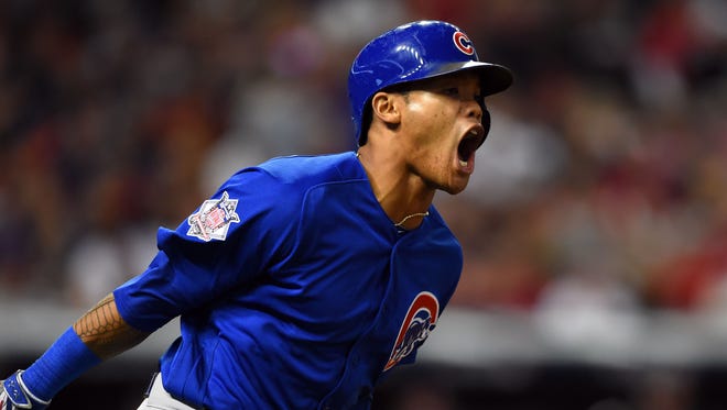 World Series, Game 6: Addison Russell becomes the first Cub player to hit a grand slam in World Series history.