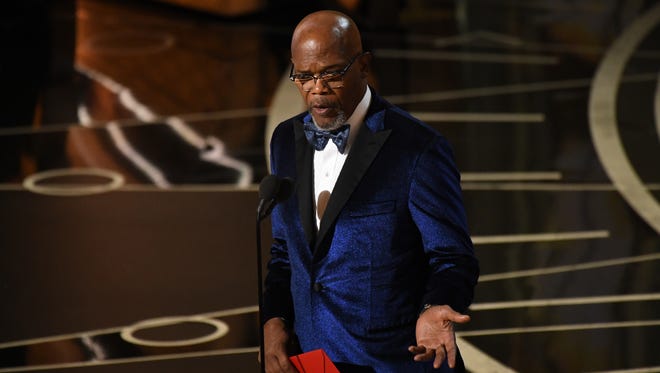 Samuel L. Jackson presents the award for  Best Original score during the 89th Academy Awards.