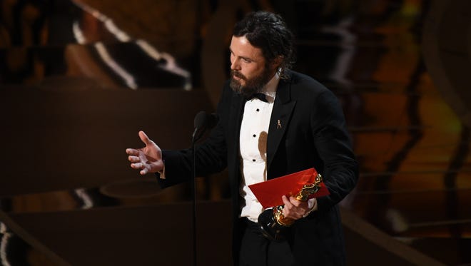 Casey Affleck  accepts the Oscar for Best Actor for his role in 'Manchester by the Sea' during the 89th Academy Awards.
