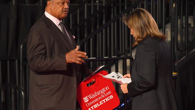 Jessie Jackson arrives in the hall prior to the second presidential debate at Washington University in St. Louis.