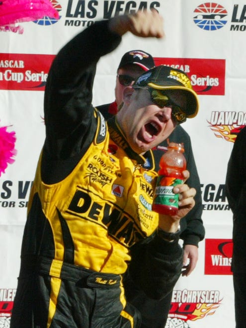 Matt Kenseth celebrating  a victory at Las Vegas Motor Speedway, won the 2003 championship. Kenseth calls Cambridge, Wis., home.