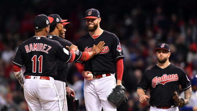 World Series, Game 1: – Indians pitcher Corey Kluber sets a World Series record with eight strikeouts through the first three innings. He finishes with nine over six innings.