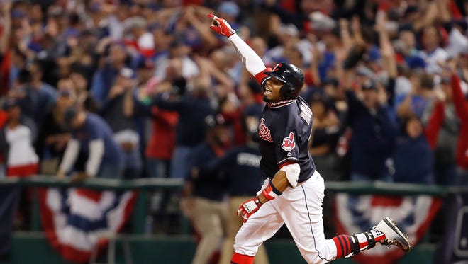 World Series, Game 7: Indians' Rajai Davis' two-run home run ties the game 6-6 with the Cubs in the bottom of the eighth inning.