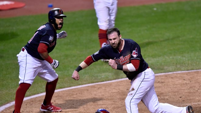 World Series, Game 7: Indians' Jason Kipnis and Carlos Santana both score on a wild pitch by Cubs' Jon Lester in the 5th inning to cut the Cleveland deficit to 5-3.
