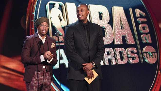 Nick Cannon and Paul Pierce speak on stage during the 2017 NBA Awards.
