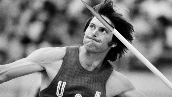 American decathlon gold medalist Bruce Jenner is shown throwing the javelin in Olympic competition in Montreal, July 30, 1976.