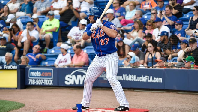 March 10: Tim Tebow waits on the on deck circle before his at-bat.